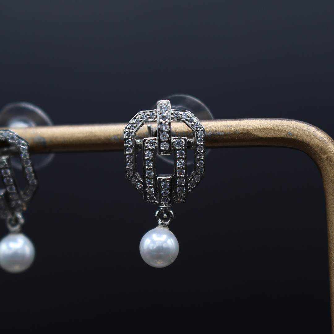 The Drawstring Pearl Drop Earrings