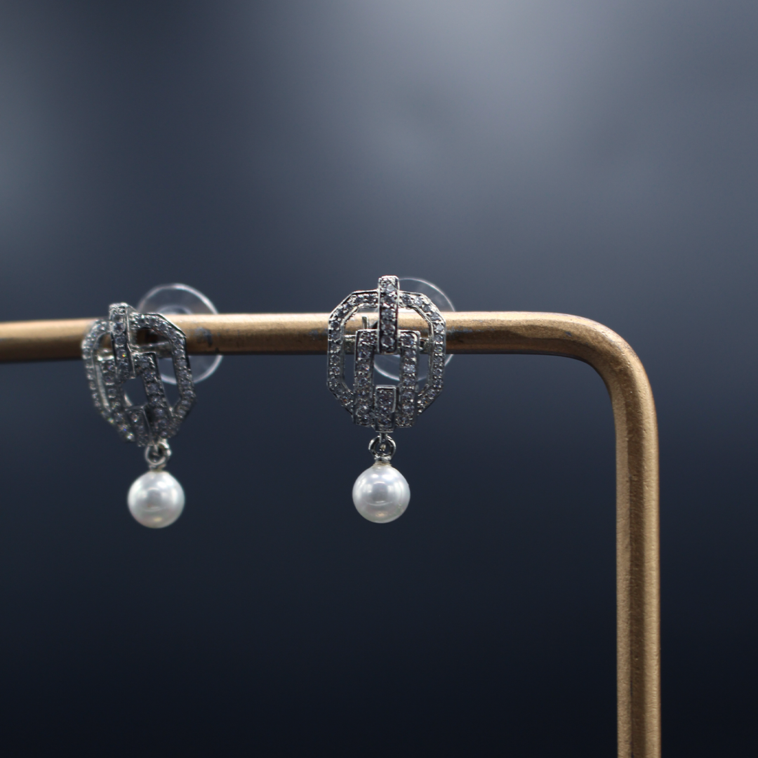 The Drawstring Pearl Drop Earrings